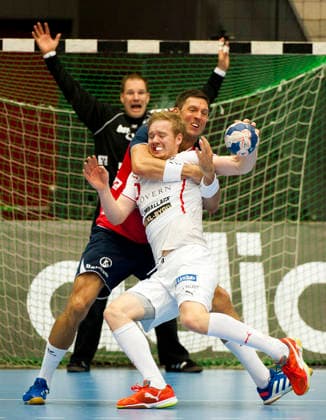 Magnus Persson of Drott and Tobias Karlsson of Flensburg during the Champions League match between Drott and Flensburg on September 25, 2013, in Halmstad, Sweden  Copyright: xAvdoxBilkanovicx