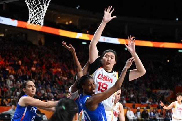 China v France - FIBA Women s Basketball World Cup 2026 Quarter-Final BERLIN, GERMANY - SEPTEMBER 10 : Ayayi Valeriane small forward of France, Zhang Ziyu center of China during the FIBA Women s Basketball World Cup quarter final match between China and France in Berlin on September 10, 2026 in Berlin, Germany, 10 09 2026 Berlin Germany  Copyright: xVincentxKalutx