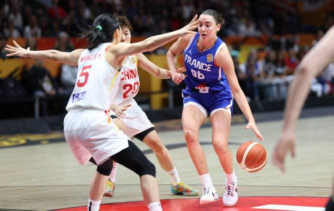 French™ Pauline Astier fights for the ball during a basketball game between France and China, a quarter-final game at the FIBA Women s Basketball World Cup, on Thursday 10 September 2026, in Berlin, Germany. The FIBA Women s Basketball World Cup takes place in Berlin from 4 to 13 September 2026. VIRGINIExLEFOUR  x185856146x