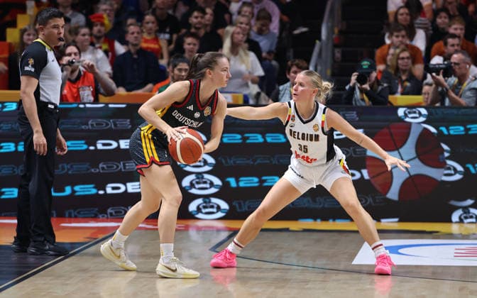 Britta Daub with the ball, Julie Vanloo in a one-on-one matchup; game action; sports; basketball; FIBA World Cup; Women s World Championship; 2026–2027 season; October 9, 2026; Belgium (BEL) vs. DBB Germany (GER)