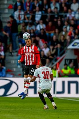 EINDHOVEN , 10-09-2026 , Philips stadium, season 2026 2027 , UEFA Champions League football , match between PSV and Shakhtar Donetsk, picture shows PSV player Filip Kostic and Shakhtar Donetsk player Alisson Santana PSV - Shakhtar Donetsk  x206825394x Copyright: