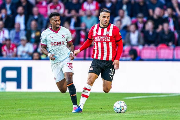 2026-09-10 PSV Eindhoven v Shaktar Donetsk - Champions League EINDHOVEN, NETHERLANDS - SEPTEMBER 10: Alisson Santana of FC Shakhtar Donetsk battles for possession with Filip Kostic of PSV Eindhoven during the Champions League match between PSV Eindhoven and Shaktar Donetsk at Philips Stadion on September 10, 2026 in Eindhoven, Netherlands. Eindhoven Philips Stadion Netherlands Content not available for redistribution in The Netherlands directly or indirectly through any third parties. Copyright: xAndrexWeeningx