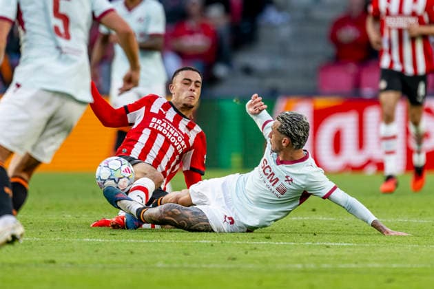 EINDHOVEN l PSV Eindhoven defender Sergino Dest and Shakhtar Donetsk midfielder Marlon Gomes after a slide tackle following Shakhtar Donetsk s goal during the UEFA Champions League match between PSV and Shakhtar Donetsk at Philips Stadion on September 10, 2026, in Eindhoven, the Netherlands. Photo by DeFodi Images