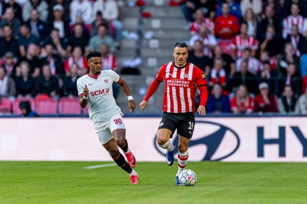 EINDHOVEN l Shakhtar Donetsk midfielder Alisson Santana and PSV Eindhoven defender Filip Kostic during the UEFA Champions League match between PSV and Shakhtar Donetsk at Philips Stadion on September 10, 2026, in Eindhoven, the Netherlands. Photo by DeFodi Images