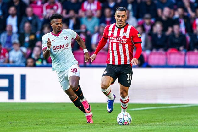2026-09-10 PSV Eindhoven v Shaktar Donetsk - Champions League EINDHOVEN, NETHERLANDS - SEPTEMBER 10: Alisson Santana of FC Shakhtar Donetsk battles for possession with Filip Kostic of PSV Eindhoven during the Champions League match between PSV Eindhoven and Shaktar Donetsk at Philips Stadion on September 10, 2026 in Eindhoven, Netherlands. Eindhoven Philips Stadion Netherlands Content not available for redistribution in The Netherlands directly or indirectly through any third parties. Copyright: xAndrexWeeningx
