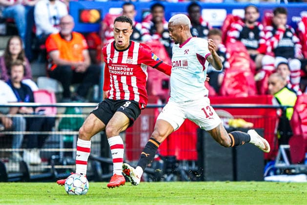2026-09-10 PSV Eindhoven v Shaktar Donetsk - Champions League EINDHOVEN, NETHERLANDS - SEPTEMBER 10: Sergino Dest of PSV Eindhoven battles for possession with Pedro Henrique of FC Shakhtar Donetsk during the Champions League match between PSV Eindhoven and Shaktar Donetsk at Philips Stadion on September 10, 2026 in Eindhoven, Netherlands. Eindhoven Philips Stadion Netherlands Content not available for redistribution in The Netherlands directly or indirectly through any third parties. Copyright: xAndrexWeeningx
