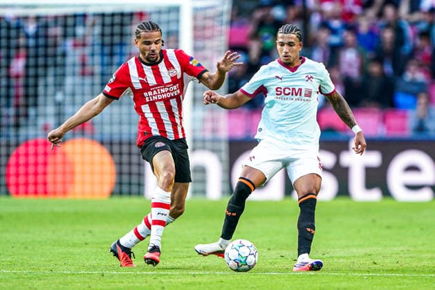2026-09-10 PSV Eindhoven v Shaktar Donetsk - Champions League EINDHOVEN, NETHERLANDS - SEPTEMBER 10: Armando Obispo of PSV Eindhoven battles for possession with Alisson Santana of FC Shakhtar Donetsk during the Champions League match between PSV Eindhoven and Shaktar Donetsk at Philips Stadion on September 10, 2026 in Eindhoven, Netherlands. Eindhoven Philips Stadion Netherlands Content not available for redistribution in The Netherlands directly or indirectly through any third parties. Copyright: xAndrexWeeningx