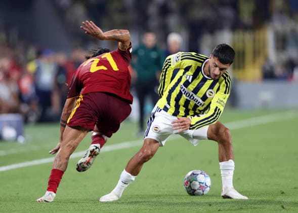 Fenerbahce v AS Roma - UEFA Champions League ISTANBUL, TURKIYE - SEPTEMBER 10: Fenerbahce s Oguz Aydin (R) competes for the ball against Paulo Dybala (21) of AS Roma during the UEFA Champions League 2026 27 league phase Matchday 1 match between Fenerbahce and Roma at Chobani Stadium in Istanbul, Turkiye, on September 10, 2026. Ali Atmaca Anadolu Istanbul Turkey. Editorial use only. Please get in touch for any other usage.  Copyright: x2026xAnadoluxAlixAtmacax