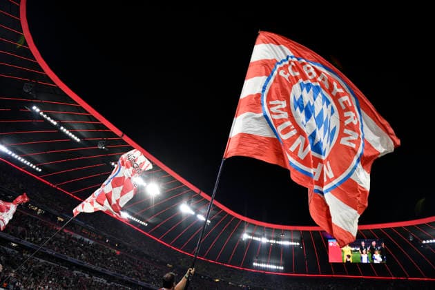 Before the game begins: Flag wavers, FC Bayern Munich logo, FC Bayern Munich, FCB vs. Bodø Glimt, September 10, 2026. DFL regulations prohibit any use of photographs as image sequences and or quasi-video. FC Bayern Munich FCB vs. Bodo Glimt