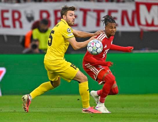 September 10, 2026, Soccer: UEFA Champions League 2026–2027, Matchday 1, FC Bayern Munich vs. FK Bodo Glimt, at the Allianz Arena in Munich; from left: Haitam Aleesami (FK Bodo Glimt) vs. Michael Olise (FC Bayern Munich)