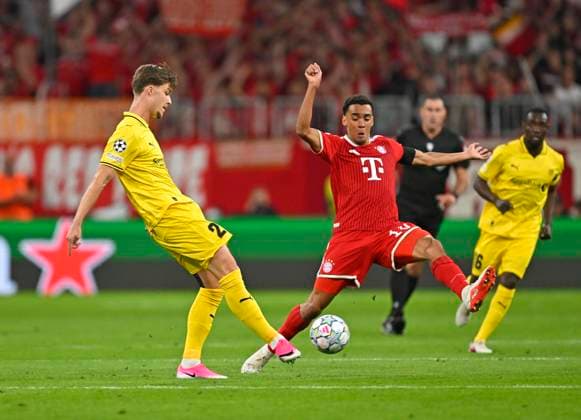 September 10, 2026, Soccer, UEFA Champions League 2026–2027, Matchday 1, FC Bayern Munich vs. FK Bodo Glimt, at the Allianz Arena in Munich; from left: Villads Nielsen (FK Bodo Glimt) vs. Jamal Musiala (Bayern Munich)