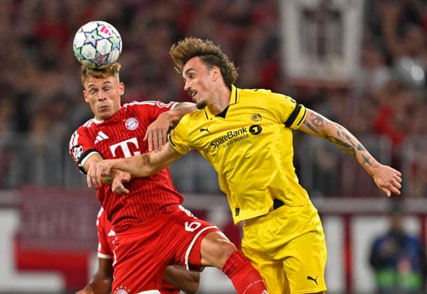 September 10, 2026, Soccer: UEFA Champions League 2026–2027, Matchday 1, FC Bayern Munich vs. FK Bodo Glimt, at the Allianz Arena in Munich; from left: Joshua Kimmich (FC Bayern Munich) vs. Andreas Helmersen (FK Bodo Glimt)