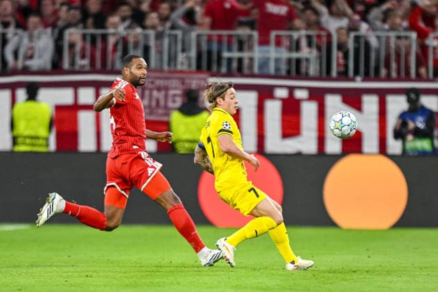 Jonathan Tah of FC Bayern Munich and Patrick Berg of FK Bodo Glimt battle for the ball during the 2026–2027 UEFA Champions League match between Bayern Munich and Bodo Glimt at Fussball Arena Munich on September 10, 2026 in Munich, Germany. Photo by Harry Langer, DeFodi Images