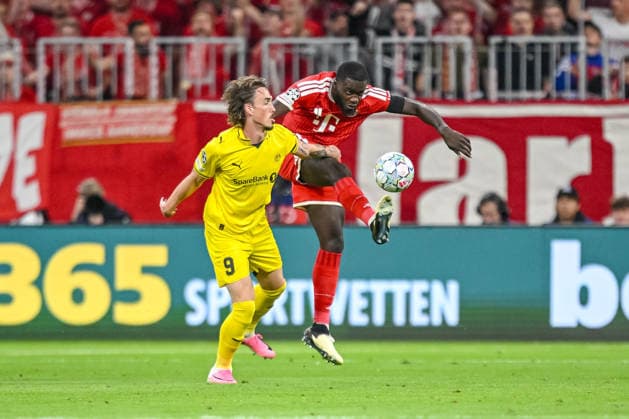 Andreas Helmersen of FK Bodo Glimt and Dayot Upamecano of FC Bayern Munich battle for the ball during the 2026–2027 UEFA Champions League match between Bayern Munich and Bodo Glimt at Fussball Arena Munich on September 10, 2026 in Munich, Germany. Photo by Harry Langer, DeFodi Images