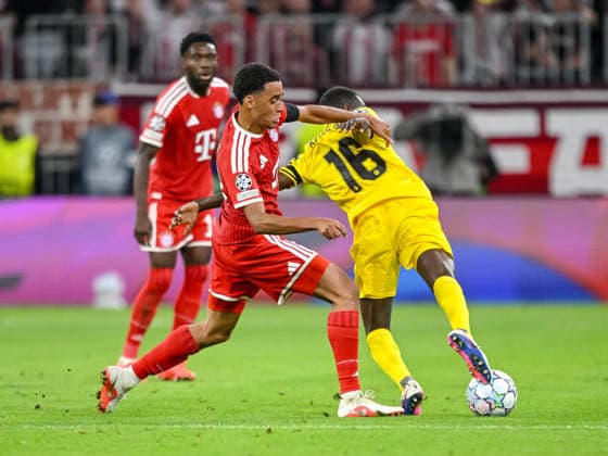 Jamal Musiala of FC Bayern Munich and Joshua Kitolano of FK Bodo Glimt battle for the ball during the 2026–2027 UEFA Champions League match between Bayern Munich and Bodo Glimt at Fussball Arena Munich on September 10, 2026 in Munich, Germany. Photo by Harry Langer, DeFodi Images