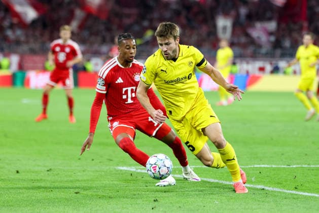 Tackle, Fredrik Bjoerkan (FK Bodo Glimt, No. 15) vs. Michael Olise (FC Bayern Munich, No. 17), GER, FC Bayern Munich vs. FK Bodo Glimt, Soccer, UEFA Champions League, Group Stage, Matchday 1, 2026–2027 season, September 10, 2026, GER, FC Bayern Munich vs. FK Bodo Glimt, Soccer, UEFA Champions League, Group Stage, Matchday 1, 2026–2027 season, September 10, 2026, Munich Copyright: xEibner-Pressefoto JennixMaulx EP_JML