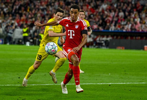 September 10, 2026, xemx, Soccer, UEFA Champions League, FC Bayern Munich vs. FK Bodø Glimt, Sondre Brunstad Fet (FK Bodø Glimt), Jamal Musiala (FC Bayern Munich), tackle, action, battle for the ball, Munich
