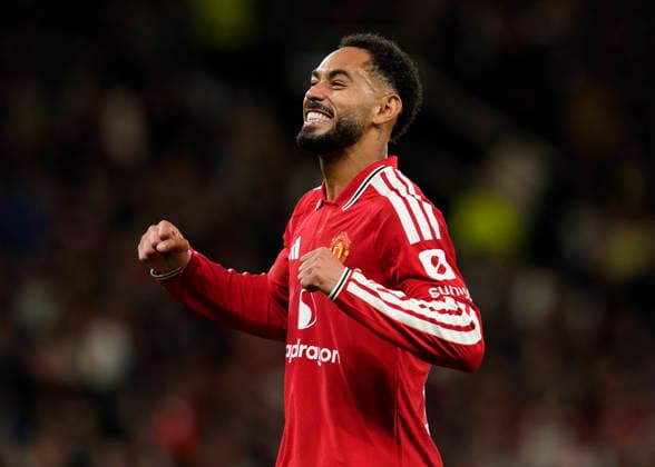 Manchester, England, 10th September 2026. Matheus Cunha of Manchester United, ManU celebrates scoring the first goal during the Manchester United vs Sabah UEFA Champions League match at Old Trafford, Manchester. Picture credit should read: Andrew Yates Sportimage EDITORIAL USE ONLY. No use with unauthorised audio, video, data, fixture lists, club league logos or live services. Online in-match use limited to 120 images, no video emulation. No use in betting, games or single club league player publications. SPI_026_AY_Man_Utd_Sabah SPI-4989-0026