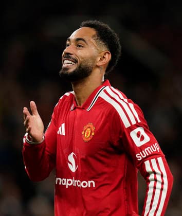 Manchester, England, 10th September 2026. Matheus Cunha of Manchester United, ManU celebrates scoring the first goal during the Manchester United vs Sabah UEFA Champions League match at Old Trafford, Manchester. Picture credit should read: Andrew Yates Sportimage EDITORIAL USE ONLY. No use with unauthorised audio, video, data, fixture lists, club league logos or live services. Online in-match use limited to 120 images, no video emulation. No use in betting, games or single club league player publications. SPI_027_AY_Man_Utd_Sabah SPI-4989-0027