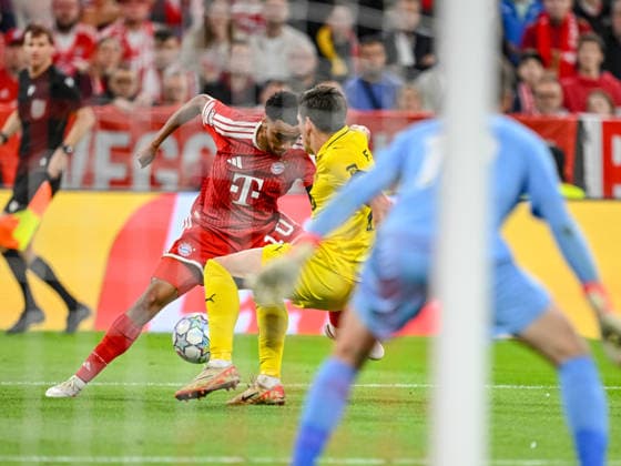 Jamal Musiala, FC Bayern Munich, Fredrik Bjorkan of FK Bodo Glimt and goalkeeper Nikita Haikin of FK Bodo Glimt battle for the ball during the 2026–2027 UEFA Champions League match between Bayern Munich and Bodo Glimt at Fussball Arena Munich on September 10, 2026 in Munich, Germany. Photo by Harry Langer, DeFodi Images