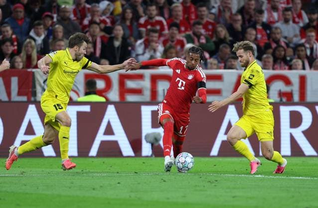 September 10, 2026, Germany, Soccer, Men s, UEFA Champions League, Group Stage, 2026–2027 Season, Matchday 1, FC Bayern Munich vs. FK Bodø Glimt: Michael Olise (FC Bayern Munich, 17) must prevail against Fredrik Bjorkan (FK Bodø Glimt, 15) and Ole Didrik Blomberg (FK Bodø Glimt, 11) at the Allianz Arena in Munich, Bavaria, Germany Copyright: xNordphoto Schneiderx