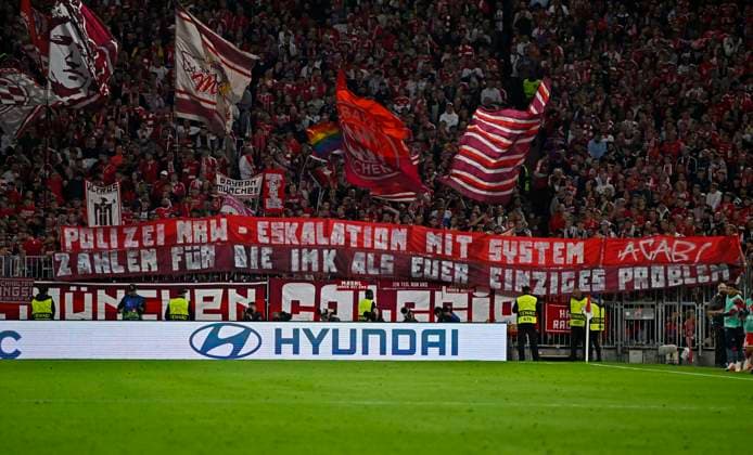 September 10, 2026, Soccer: UEFA Champions League 2026–2027, Matchday 1, FC Bayern Munich vs. FK Bodo Glimt, at the Allianz Arena in Munich; banner held by Bayern fans