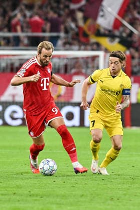 MUNICH, GERMANY; 10. SEPTEMBER: tackle between Harry KANE (FC Bayern Munich 9) and Patrick BERG (FK Bodo 7) during the Champions League Match between FC Bayern Muenchen vs. FK Bodo Glimt at Matchday 1 at Allianz Arena Copyright: xBEAUTIFULxSPORTS Goldbergx