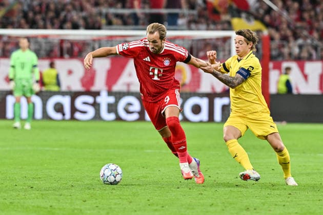 MUNICH, GERMANY; 10. SEPTEMBER: tackle between Harry KANE (FC Bayern Munich 9) and Patrick BERG (FK Bodo 7) during the Champions League Match between FC Bayern Muenchen vs. FK Bodo Glimt at Matchday 1 at Allianz Arena Copyright: xBEAUTIFULxSPORTS Goldbergx
