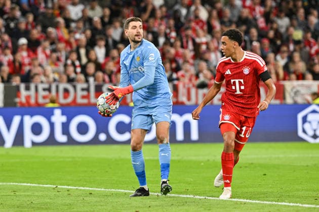 MUNICH, GERMANY; 10. SEPTEMBER: tackle between Nikita HAIKIN (FK Boko 12) and Jamal MUSIALA (FC Bayern Munich 10) during the Champions League Match between FC Bayern Muenchen vs. FK Bodo Glimt at Matchday 1 at Allianz Arena Copyright: xBEAUTIFULxSPORTS Goldbergx