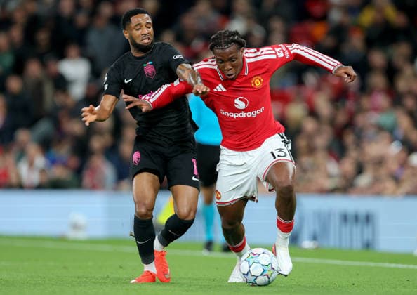 Manchester United, ManU v Sabah FC - UEFA Champions League 2026 27 League Phase MD1 Kaheem Parris of Sabah and Patrick Dorgu of Manchester United challenge during the UEFA Champions League 2026 27 League Phase MD1 match between Manchester United and Sabah FC at Old Trafford on September 10, 2026 in Manchester, England. Manchester Old Trafford England United Kingdom Copyright: xAllstarxPicturexLibraryxLtdx