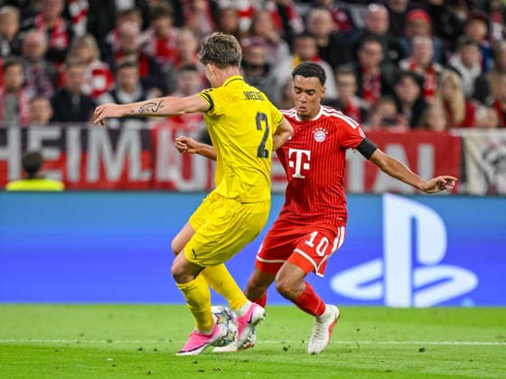 Villads Nielsen of FK Bodo Glimt and Jamal Musiala of FC Bayern Munich battle for the ball during the 2026–2027 UEFA Champions League match between Bayern Munich and Bodo Glimt at Fussball Arena Munich on September 10, 2026 in Munich, Germany. Photo by Harry Langer, DeFodi Images