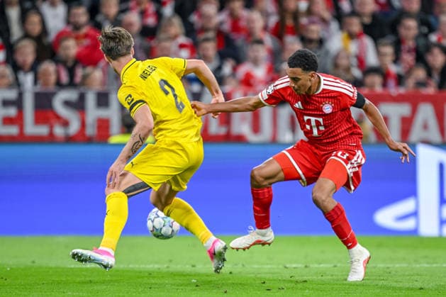 Villads Nielsen of FK Bodo Glimt and Jamal Musiala of FC Bayern Munich battle for the ball during the 2026–2027 UEFA Champions League match between Bayern Munich and Bodo Glimt at Fussball Arena Munich on September 10, 2026 in Munich, Germany. Photo by Harry Langer, DeFodi Images
