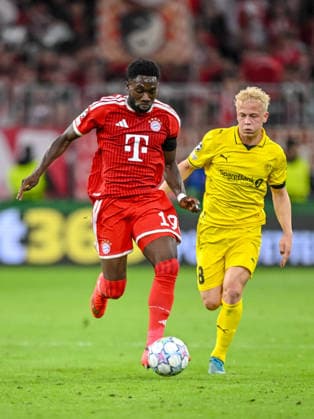 Alphonso Davies of FC Bayern Munich and Sondre Auklend of FK Bodo Glimt battle for the ball during the 2026–2027 UEFA Champions League match between Bayern Munich and Bodo Glimt at Fussball Arena Munich on September 10, 2026 in Munich, Germany. Photo by Harry Langer, DeFodi Images