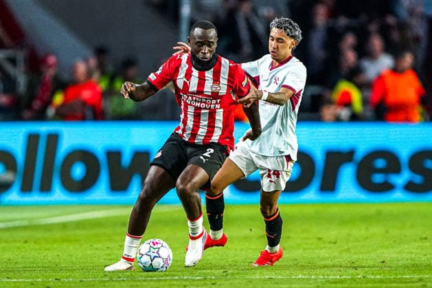 2026-09-10 PSV Eindhoven v Shaktar Donetsk - Champions League EINDHOVEN, NETHERLANDS - SEPTEMBER 10: Lutsharel Geertruida of PSV Eindhoven battles for possession with Isaque of FC Shakhtar Donetsk during the Champions League match between PSV Eindhoven and Shaktar Donetsk at Philips Stadion on September 10, 2026 in Eindhoven, Netherlands. Eindhoven Philips Stadion Netherlands Content not available for redistribution in The Netherlands directly or indirectly through any third parties. Copyright: xAndrexWeeningx