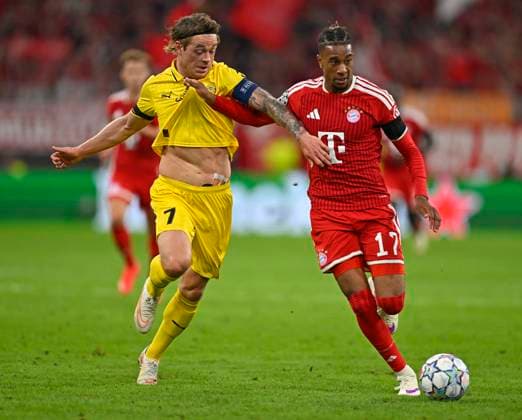 September 10, 2026, Soccer: UEFA Champions League 2026–2027, Matchday 1, FC Bayern Munich vs. FK Bodo Glimt, at the Allianz Arena in Munich; from left: Patrick Berg (FK Bodo Glimt) vs. Michael Olise (FC Bayern Munich)