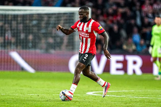 2026-09-10 PSV Eindhoven v Shaktar Donetsk - Champions League EINDHOVEN, NETHERLANDS - SEPTEMBER 10: Lutsharel Geertruida of PSV Eindhoven runs with the ball during the Champions League match between PSV Eindhoven and Shaktar Donetsk at Philips Stadion on September 10, 2026 in Eindhoven, Netherlands. Eindhoven Philips Stadion Netherlands Content not available for redistribution in The Netherlands directly or indirectly through any third parties. Copyright: xAndrexWeeningx