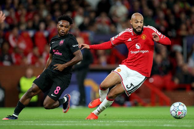 Manchester United, ManU v Sabah FC - UEFA Champions League 2026 27 League Phase MD1 Christian Nwachukwu of Sabah and Noussair Mazraoui of Manchester United challenge during the UEFA Champions League 2026 27 League Phase MD1 match between Manchester United and Sabah FC at Old Trafford on September 10, 2026 in Manchester, England. Manchester Old Trafford England United Kingdom Copyright: xAllstarxPicturexLibraryxLtdx