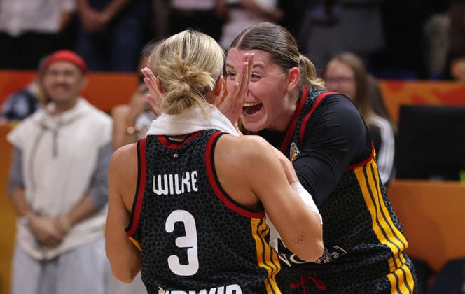 Alexandra Wilke, Luisa Geiselsöder, and the German team celebrate after the game and advance to the semifinals. Sports: Basketball, FIBA World Cup, Women s World Championship, 2026–2027 Season, October 9, 2026, Belgium (BEL) vs. DBB Germany (GER)