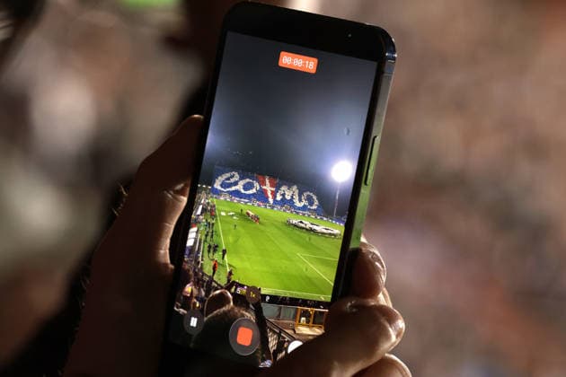 Como 1907 v RB Leipzig - UEFA Champions League - Season 2026-2027 Como, Italy, 10th September 2026. A general view of a fan™s mobile as they caputre footage of the Como 1907 fans™ choreography prior to the Como 1907 vs RB Leipzig UEFA Champions League, group phase match at Stadio Giuseppe Sinigaglia, Como. Picture credit should read: Jonathan Moscrop Como Stadio Giuseppe Sinigaglia Italy