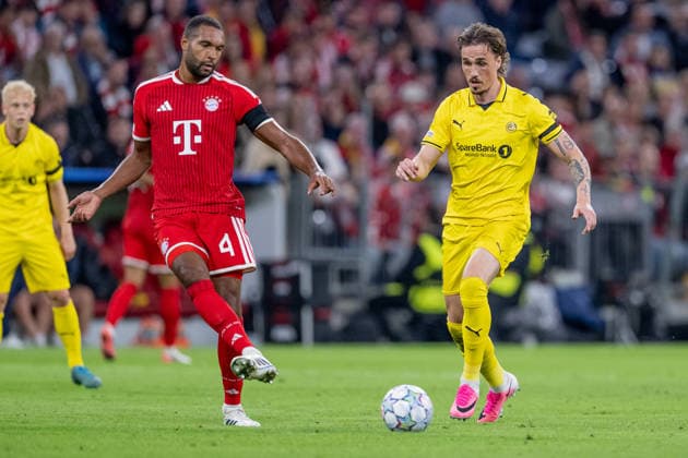 Battle for the Ball: Tackle between Jonathan Tah (FC Bayern Munich, 04) and Andreas Helmersen (FK Bodo Glimt, 09) GER, FC Bayern Munich vs. FK Bodo Glimt, Soccer, UEFA Champions League, Group Stage, Matchday 1, 2026–2027 season, September 10, 2026. DFL and DFB regulations prohibit any use of photographs as image sequences and or quasi-video. Photo: HMB Media, Heike Feiner Copyright: HMBxMedia HeikexFeiner