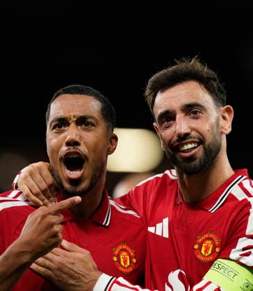 Manchester, England, 10th September 2026. Second goal scorer Bruno Fernandes of Manchester United, ManU (r) celebrates with Youri Tielemans of Manchester United (l) during the Manchester United vs Sabah UEFA Champions League match at Old Trafford, Manchester. Picture credit should read: Andrew Yates Sportimage EDITORIAL USE ONLY. No use with unauthorised audio, video, data, fixture lists, club league logos or live services. Online in-match use limited to 120 images, no video emulation. No use in betting, games or single club league player publications. SPI_038_AY_Man_Utd_Sabah SPI-4989-0038