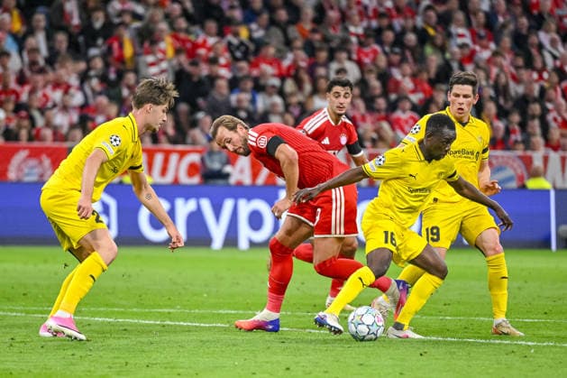 Harry Kane of FC Bayern Munich and Joshua Kitolano of FK Bodo Glimt battle for the ball during the 2026–2027 UEFA Champions League match between Bayern Munich and Bodo Glimt at Fussball Arena Munich on September 10, 2026 in Munich, Germany. Photo by Harry Langer, DeFodi Images