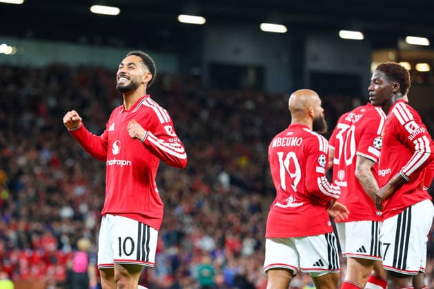 RECORD DATE NOT STATED 10th September 2026; Old Trafford, Manchester, England; UEFA Champions League Football, Manchester United, ManU versus Sabah; Matheus Cunha of Manchester United scores to make it 1-0 in the 27th minute and is congratulated by team mates RogerxEvans
