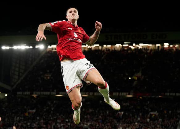 Manchester, England, 10th September 2026. Benjamin Sesko of Manchester United, ManU celebrates scoring their third goal during the Manchester United vs Sabah UEFA Champions League match at Old Trafford, Manchester. Picture credit should read: Andrew Yates Sportimage EDITORIAL USE ONLY. No use with unauthorised audio, video, data, fixture lists, club league logos or live services. Online in-match use limited to 120 images, no video emulation. No use in betting, games or single club league player publications. SPI_041_AY_Man_Utd_Sabah SPI-4989-0041