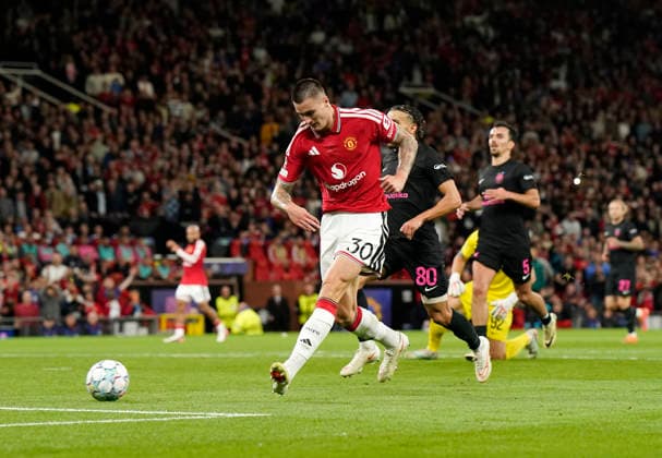 Manchester, England, 10th September 2026. Benjamin Sesko of Manchester United, ManU scores the third goal during the Manchester United vs Sabah UEFA Champions League match at Old Trafford, Manchester. Picture credit should read: Andrew Yates Sportimage EDITORIAL USE ONLY. No use with unauthorised audio, video, data, fixture lists, club league logos or live services. Online in-match use limited to 120 images, no video emulation. No use in betting, games or single club league player publications. SPI_044_AY_Man_Utd_Sabah SPI-4989-0044