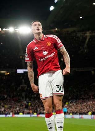 Manchester, England, 10th September 2026. Benjamin Sesko of Manchester United, ManU celebrates scoring their third goal during the Manchester United vs Sabah UEFA Champions League match at Old Trafford, Manchester. Picture credit should read: Andrew Yates Sportimage EDITORIAL USE ONLY. No use with unauthorised audio, video, data, fixture lists, club league logos or live services. Online in-match use limited to 120 images, no video emulation. No use in betting, games or single club league player publications. SPI_045_AY_Man_Utd_Sabah SPI-4989-0047