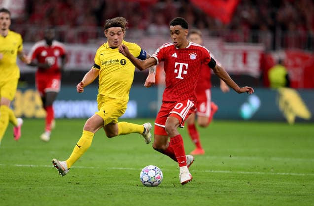 SOCCER CHAMPIONS LEAGUE 2026–2027 SEASON Preliminary Round, Matchday 1, September 10, 2026: FC Bayern Munich vs. FK Bodo Glimt—Patrick Berg (left), FK Bodo Glimt, vs. Jamal Musiala (right), FC Bayern Munich