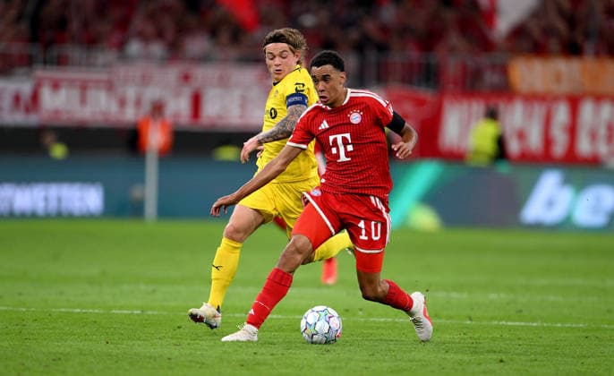 SOCCER CHAMPIONS LEAGUE 2026–2027 SEASON Preliminary Round, Matchday 1, September 10, 2026: FC Bayern Munich vs. FK Bodo Glimt—Patrick Berg (left), FK Bodo Glimt, vs. Jamal Musiala (right), FC Bayern Munich