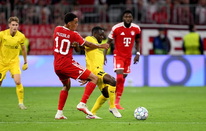 SOCCER CHAMPIONS LEAGUE 2026–2027 SEASON Preliminary Round, Matchday 1, September 10, 2026: FC Bayern Munich vs. FK Bodø Glimt; Jamal Musiala (left), FC Bayern Munich, vs. Joshua Kitolano (right), FK Bodø Glimt