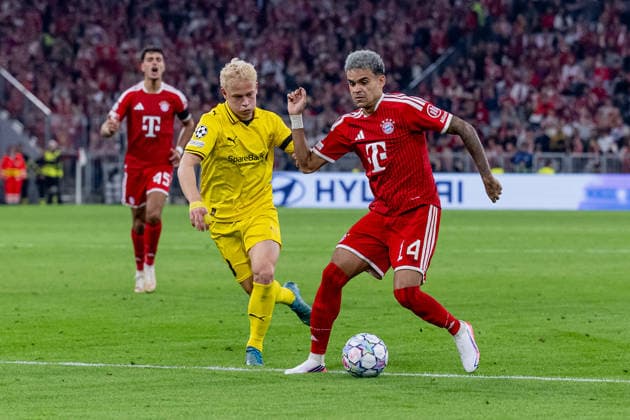 Battle for the Ball: Tackle between Sondre Auklend (FK Bodo Glimt, 08) and Luis Diaz (FC Bayern Munich, 14) GER, FC Bayern Munich vs. FK Bodo Glimt, Soccer, UEFA Champions League, Group Stage, Matchday 1, 2026–2027 season, September 10, 2026. DFL and DFB regulations prohibit any use of photographs as image sequences and or quasi-video. Photo: HMB Media, Heike Feiner Copyright: HMBxMedia HeikexFeiner